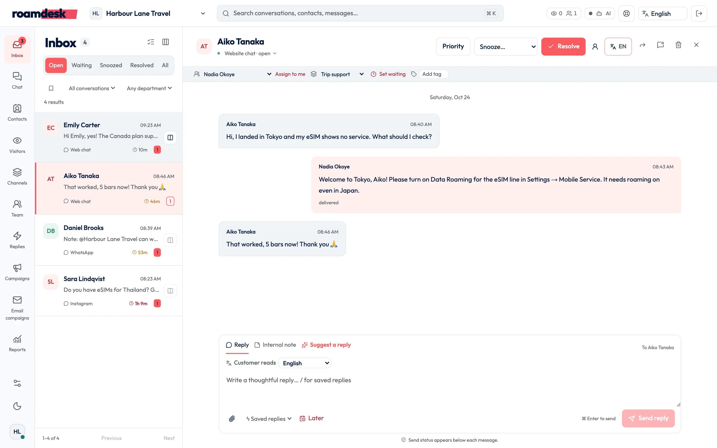 RoamDesk with a queue of conversations from website chat, WhatsApp and Instagram, and an open chat with a traveler in Tokyo